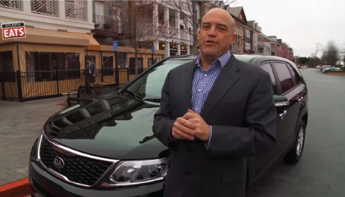 Steak in front of his KIA Sorento