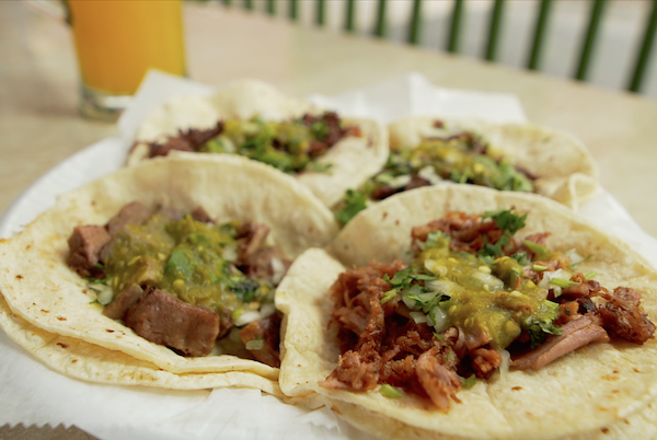 Fill up on barbacoa tacos with salsa verde from El Taco Veloz.