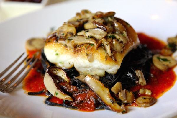 Hidden Gem Striped sea bass over black linguini at La Grotta