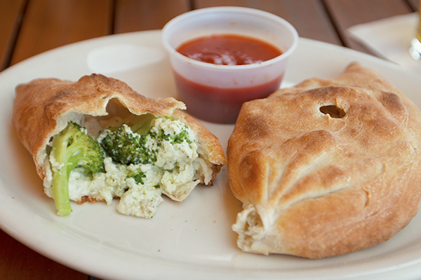 Calzones filled with mozzarella and pesto- ricotta from Camelis pizza 