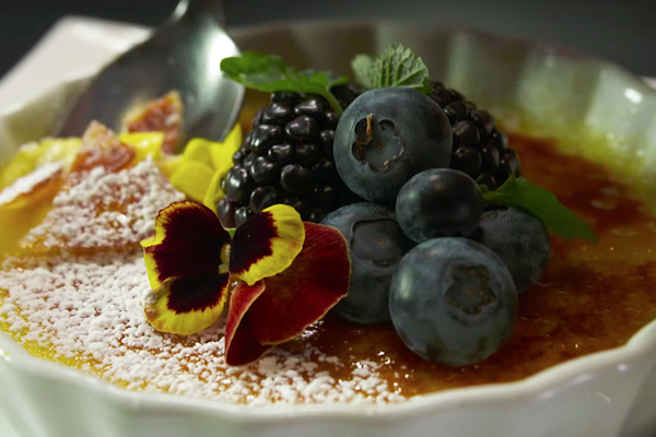 Creme Brulee with fresh berries from Nikolai's roof 