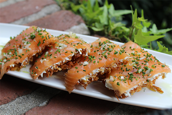 the house smoked salmon on a cake of latke at Canoe