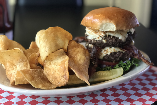 The black and blue burger with chips from Kirby G's diner