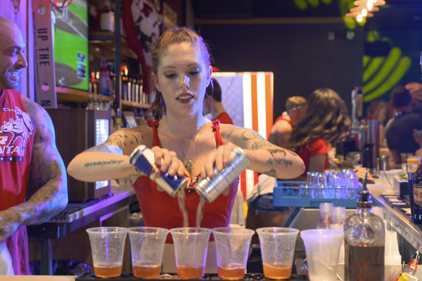 bartender pouring a drink at PBR Atlanta 