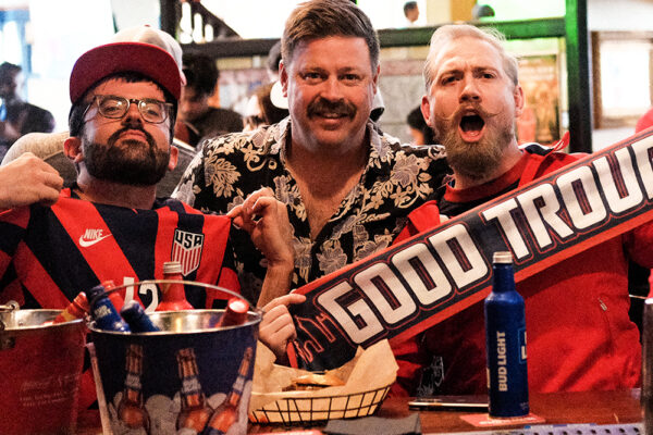 Fans watch soccer at Fado