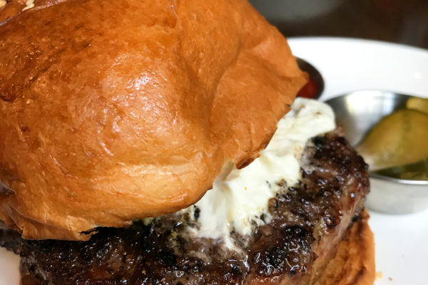 The Cook Hall hamburger with capers and cheese spread