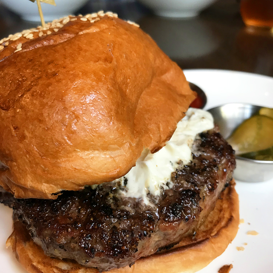 The Cook Hall hamburger with capers and cheese spread