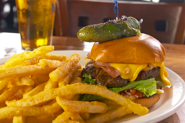 This burger is no ordinary burger. This dish at Jimmy’s is their Mexican burger, with a patty made up of beef and pork, and served with ham, cheese, bacon, avocado, tomato, onions, lettuce, and grilled jalapeno on top. And of course, fries on the side.