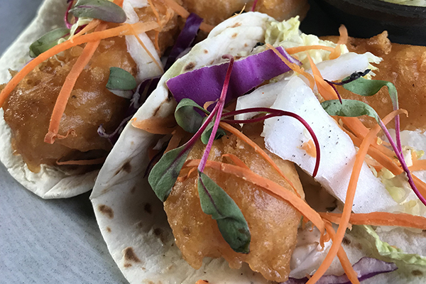 battered fish tacos from Chido and Padre's