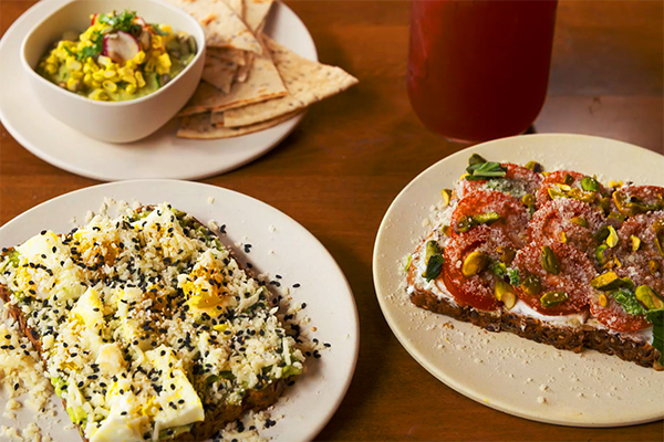 The Smashed Avocado and Tomato Toasts at Flower Child