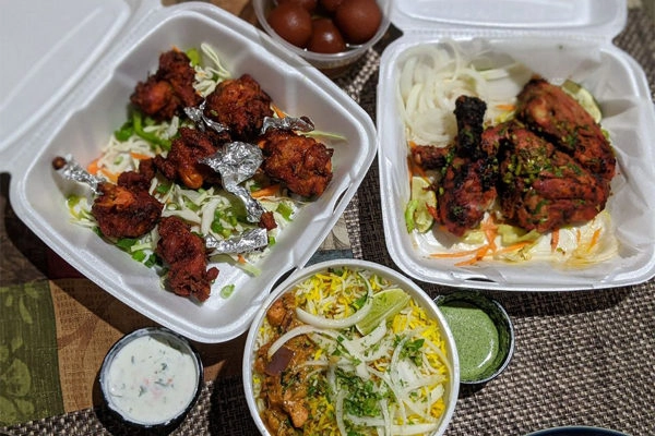 Hyderabad House Atlanta - Chicken Lollipops | Photo: Yelp