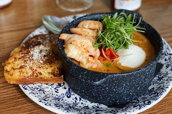 Botica - Shrimp & Grits | Photo: Facebook/eatbotica