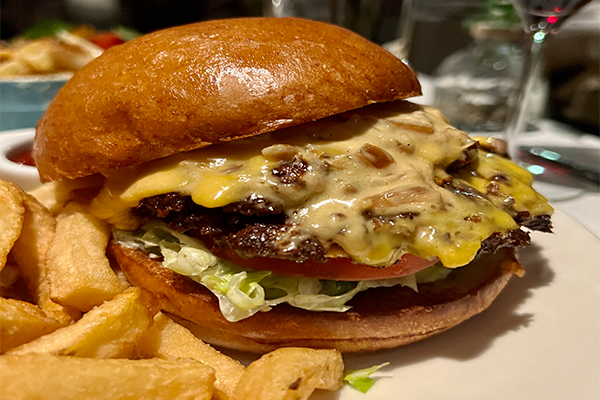 Double cheeseburger and fries from THE CHASTAIN