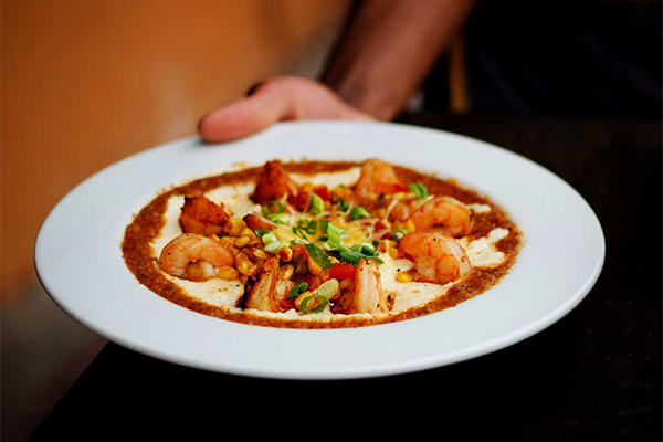 Plate of shrimp and grits