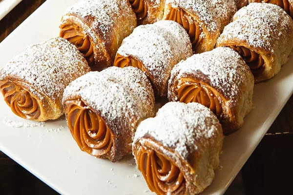 Cañones rellenos de dulce de leche from Panaderia Criolla in Lawrenceville