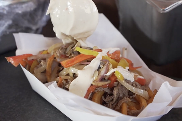 Cheesesteak potato from Bootlegger's in Atlanta Motor Speedway.