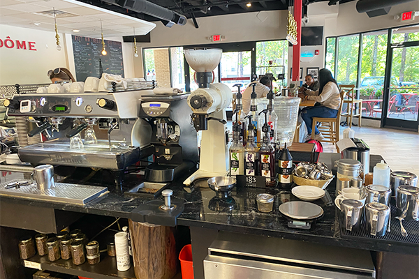 Coffee equipment behind the counter at Cafe Vendome