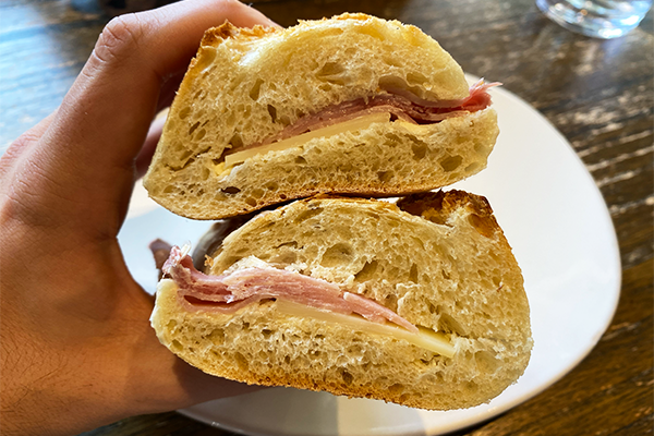 Ham, cheese, and butter sandwich on baguette