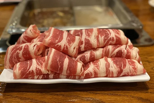 Dip Chuan Yu's beef brisket into the boiling pots of broth to cook | Photo: Yelp | 1300 Peachtree Industrial Blvd. Unit 3101 Suwanee, GA 30024