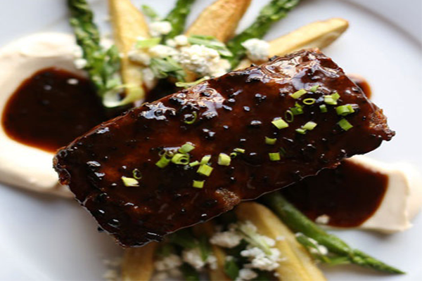 Meatloaf with potatoes, broccolini, and a cauliflower puree