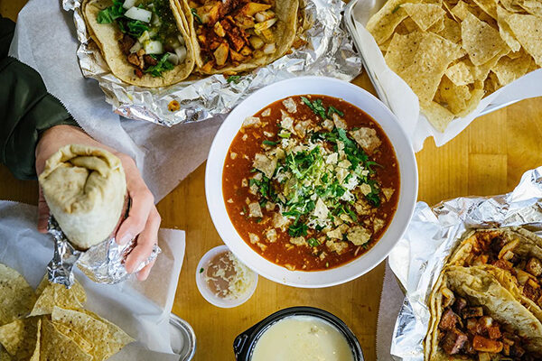 Chili, tortilla chips, tacos and other dishes from Bell Street Burritos.