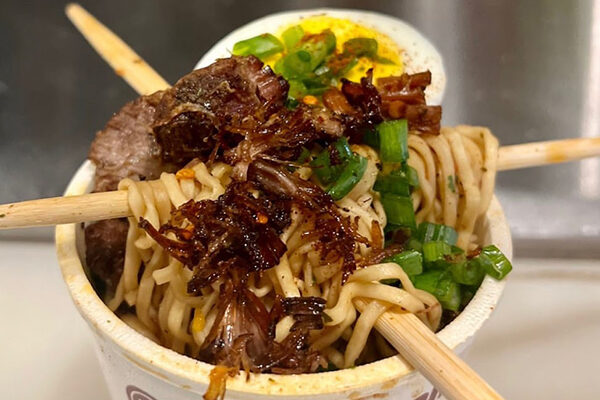 The Smack-N-Mein beef cup o' noodles dish from Smack'n Asian Cajun Nation in East Atlanta Village's We Suki We Suki.