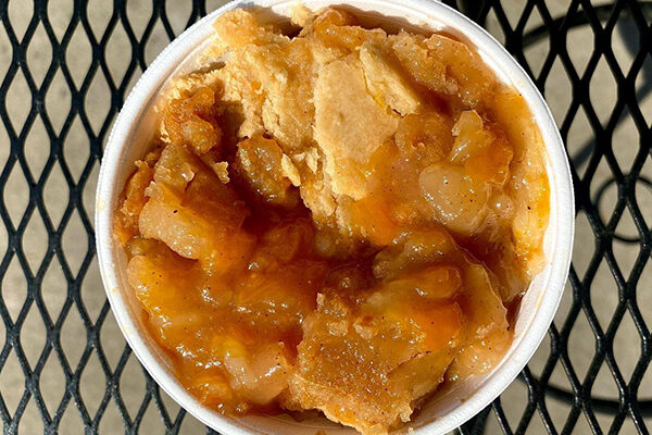 The peach cobbler from Ms. Ruby's Peach Cobbler Cafe.