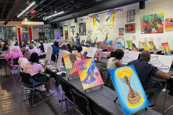 Patrons at Paint, Sip, Socialize in East Atlanta Village.