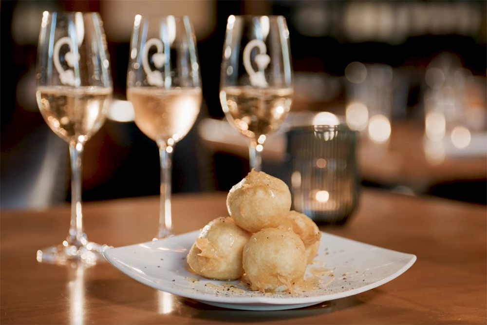 Goat cheese beignets from Cru Food and Wine Bar.